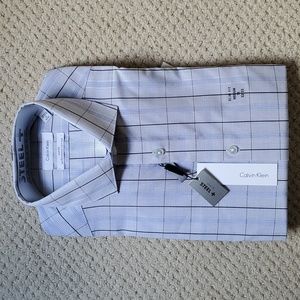NWT Calvin Klein Men's Dress Shirt,   Slim fit, 15 32-33, light blue pattern.